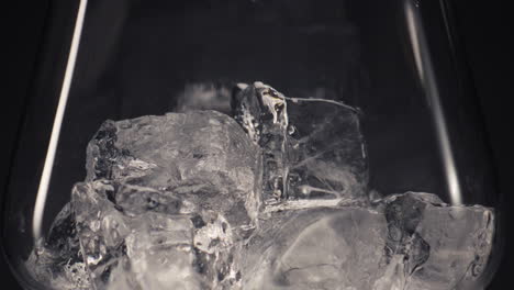 Mint-garnish-ice-cocktail-close-up.-Preparing-fresh-party-beverage-concept