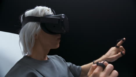 Involved-guy-touching-playing-virtual-world-game-closeup.-Man-VR-digital-space
