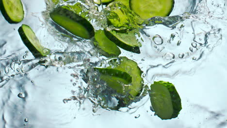 Cucumber-slices-splashing-water-in-super-slow-motion-close-up.-Vegetable-falling