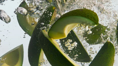 Avocado-slices-dropped-liquid-in-super-slow-motion-close-up.-Vitamin-vegetable.