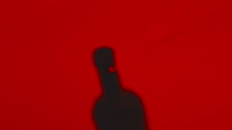 Macro-wine-drop-flowing-alcoholic-drink.-Falling-blob-liquid-diverging-circles