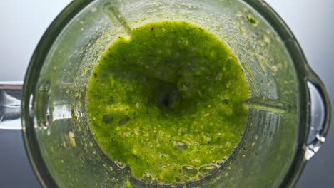 Top-view-blend-vegetables-swirling-inside-blender-in-super-slow-motion-close-up.