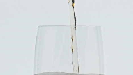 Jet-pouring-foamy-beer-vessel-slow-motion.-Barley-alcohol-drink-glassware-macro