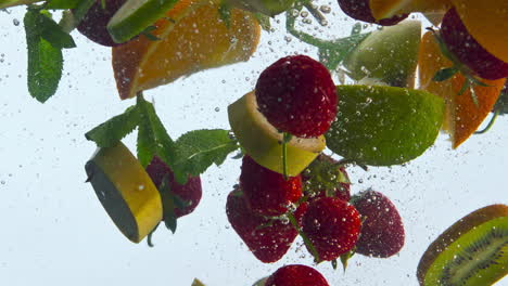 Floating-fresh-fruits-underwater-in-super-slow-motion-close-up.-Healthy-food.