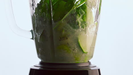 Preparing-vegetable-smoothie-blender-in-super-slow-motion-close-up.-Organic-food