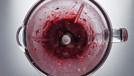 Fresh-berry-smoothie-swirling-inside-blender-in-super-slow-motion-close-up.
