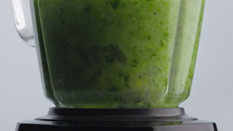 Vegetable-puree-mixing-blender-in-super-slow-motion-closeup.-Vegetarian-smoothie