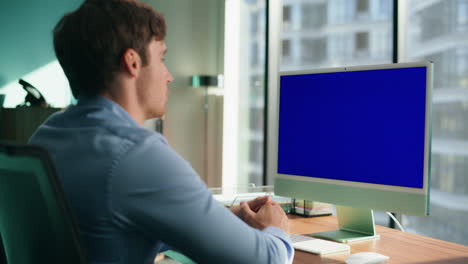 Unknown-employee-talking-blue-screen-monitor-closeup.-Ceo-gesturing-video-chat