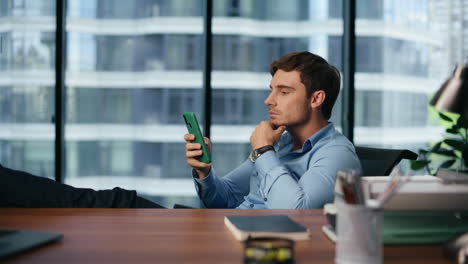 Thoughtful-businessman-reading-serious-news-phone-closeup.-Corporate-lifestyle