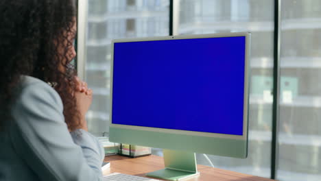 Unknown-employee-talking-blue-screen-monitor-closeup.-Office-manager-video-chat