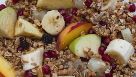Crispy-granola-fresh-fruits-preparing-for-breakfast-closeup.-Vegetarian-food.
