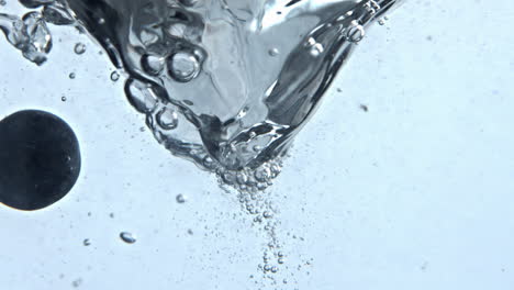 Detox-liquid-berries-swirling-clean-vessel-closeup.-Carbonated-cocktail-funnel