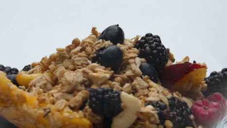 Tasty-oatmeal-fresh-berries-fruits-on-gray-background-closeup.-Healthy-breakfast