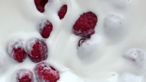 Pink-raspberry-floating-dessert-closeup.-Summer-berries-milk-yoghurt-breakfast