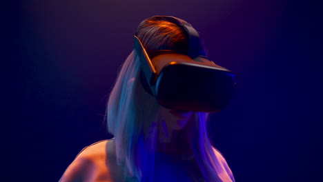 Millennial-girl-taking-on-vr-glasses-closeup.-Woman-preparing-to-3d-experience