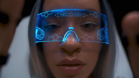Closeup-sensors-hands-person-exploring-futuristic-cyberspace.-Metaverse-concept