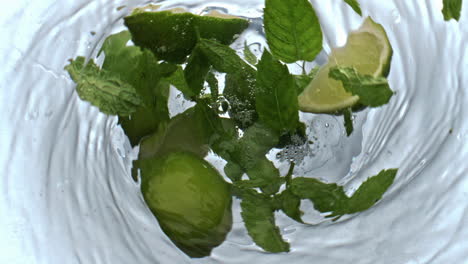 Mojito-spinning-inside-glassware-above-view.-Citrus-mineral-water-tornado-drink