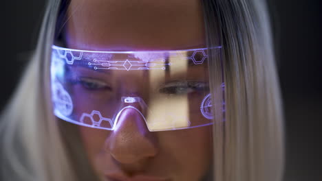Focused-woman-watching-VR-headset-closeup.-Interested-girl-enjoying-3d-movie