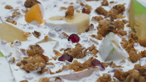 Fruit-cereal-milk-dessert-close-up.-Vitamin-organic-ingredients-dipped-in-yogurt