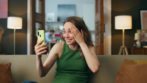 Shocked-woman-watching-cellphone-at-home-closeup.-Surprised-girl-receiving-news