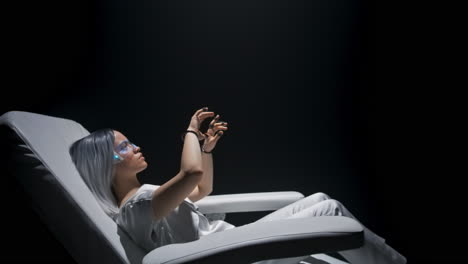 Haptic-sensors-woman-touching-interface.-Future-reality-gamer-enjoying-metaverse