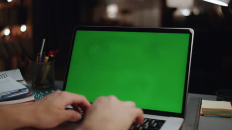 Man-hands-typing-chromakey-laptop-remote-office-closeup.-Worker-texting-keyboard