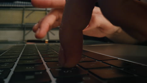 Woman-hands-pressing-keyboard-at-night-closeup.-Freelance-girl-typing-buttons