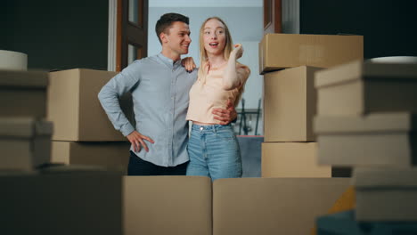 Married-couple-buy-apartment-using-mortgage.-Family-moving-in-new-apartment.