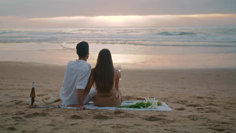Tender-family-watching-sea-horizon-on-vacation.-Couple-bonding-vertically-video