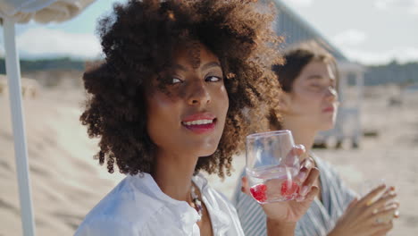 Beautiful-woman-enjoying-cocktail-closeup.-Happy-african-american-drinking-soda