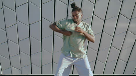 Flexible-dancer-perform-urban-architecture.-Man-giving-contemporary-dance-lesson