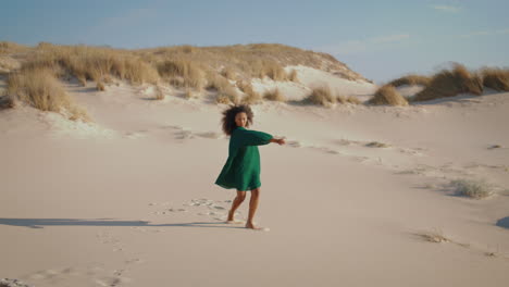 Dancer-performing-summer-desert-alone.-Curly-girl-dance-sand-beach-mesmerizingly