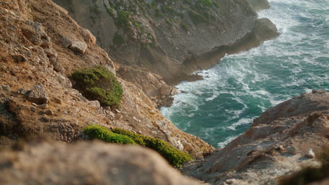 Sea-beach-cliff-nature-aerial-vertical-view.-Rocky-shore-island-foamy-ocean
