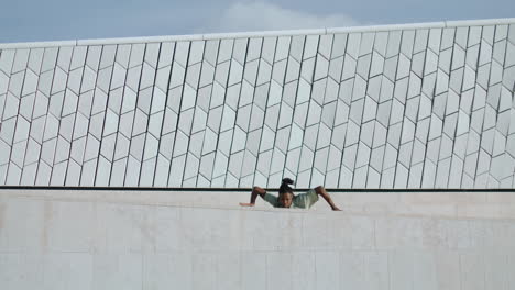 Contemporary-dancer-enjoying-performance-at-stadium-vertical.-Inspired-guy-dance
