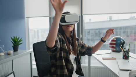 Involved-designer-touching-vr-screen-office-closeup.-Headset-woman-creating-game