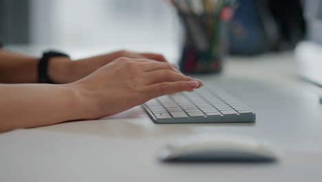 Closeup-girl-fingers-texting-keyboard-at-home.-Student-hands-pressing-computer