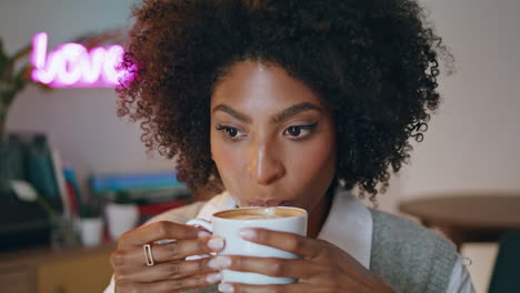 Woman-enjoy-aromatic-coffee-sitting-cafe-closeup.-Girl-drinking-fresh-cappuccino