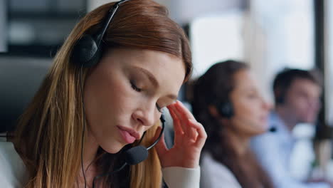 Nervous-telemarketing-assistant-talking-headset-closeup.-Annoyed-woman-talking