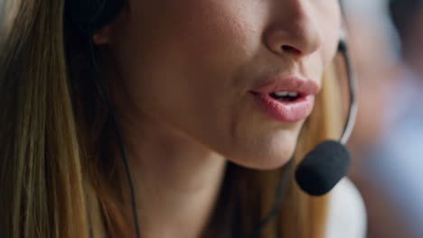 Operator-lips-talking-microphone-closeup.-Telemarketing-agent-consulting-client