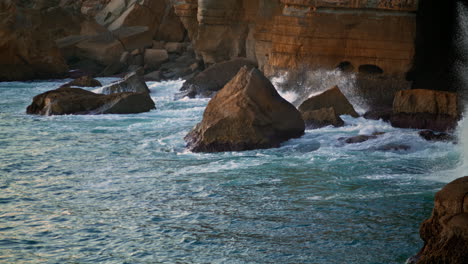 Sea-waves-crashing-cliff-in-summer.-Dangerous-seashore-nature-beauty-in-motion.
