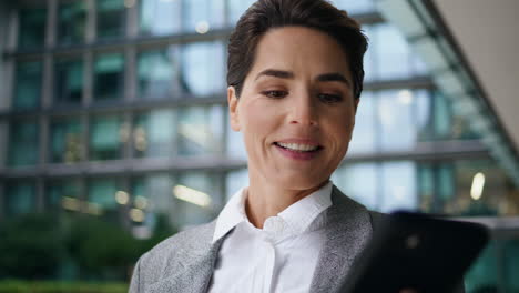 Cheerful-businesswoman-looking-mobile-phone-closeup.-Excited-manager-check-email