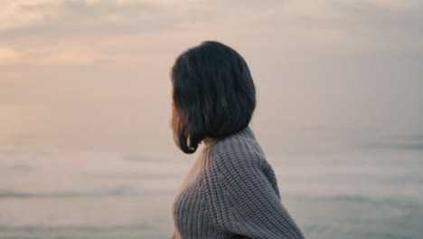 Lonely-woman-posing-ocean-gloomy-evening-closeup.-Brunette-feeling-loneliness.