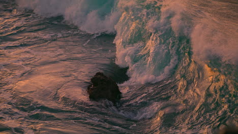 Dark-sea-foaming-at-evening-nature-closeup.-Sunset-waves-breaking-at-shoreline
