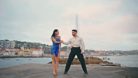 Hot-tango-dancers-moving-seductively-on-gloomy-waterfront.-Sexy-partners-dancing