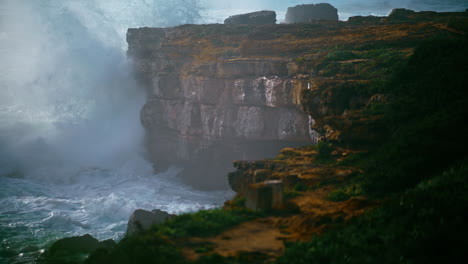 Storm-surf-breaking-cliffs-in-super-slow-motion.-Powerful-waves-breaking-rocky