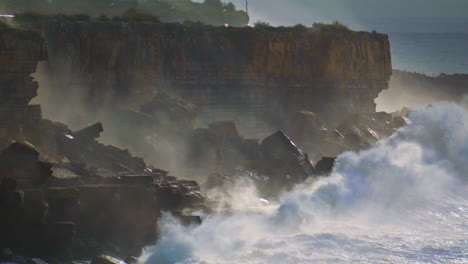 Powerful-waves-breaking-cliffs-making-explosion-splashing-in-super-slow-motion.