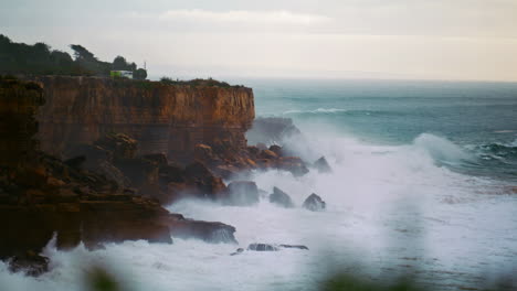 Stormy-ocean-breaking-cliffs-in-slow-motion.-Powerful-waves-crashing-wild-rocky
