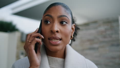 Serious-woman-talking-phone-closeup.-Worried-african-american-discuss-business