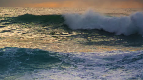 Morning-waves-swelling-coast-before-storm.-Powerful-white-surf-rolling-breaking