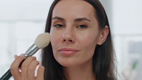 Morning-model-makeup-routine-at-home-mirror-pov-portrait.-Woman-preparing-visage